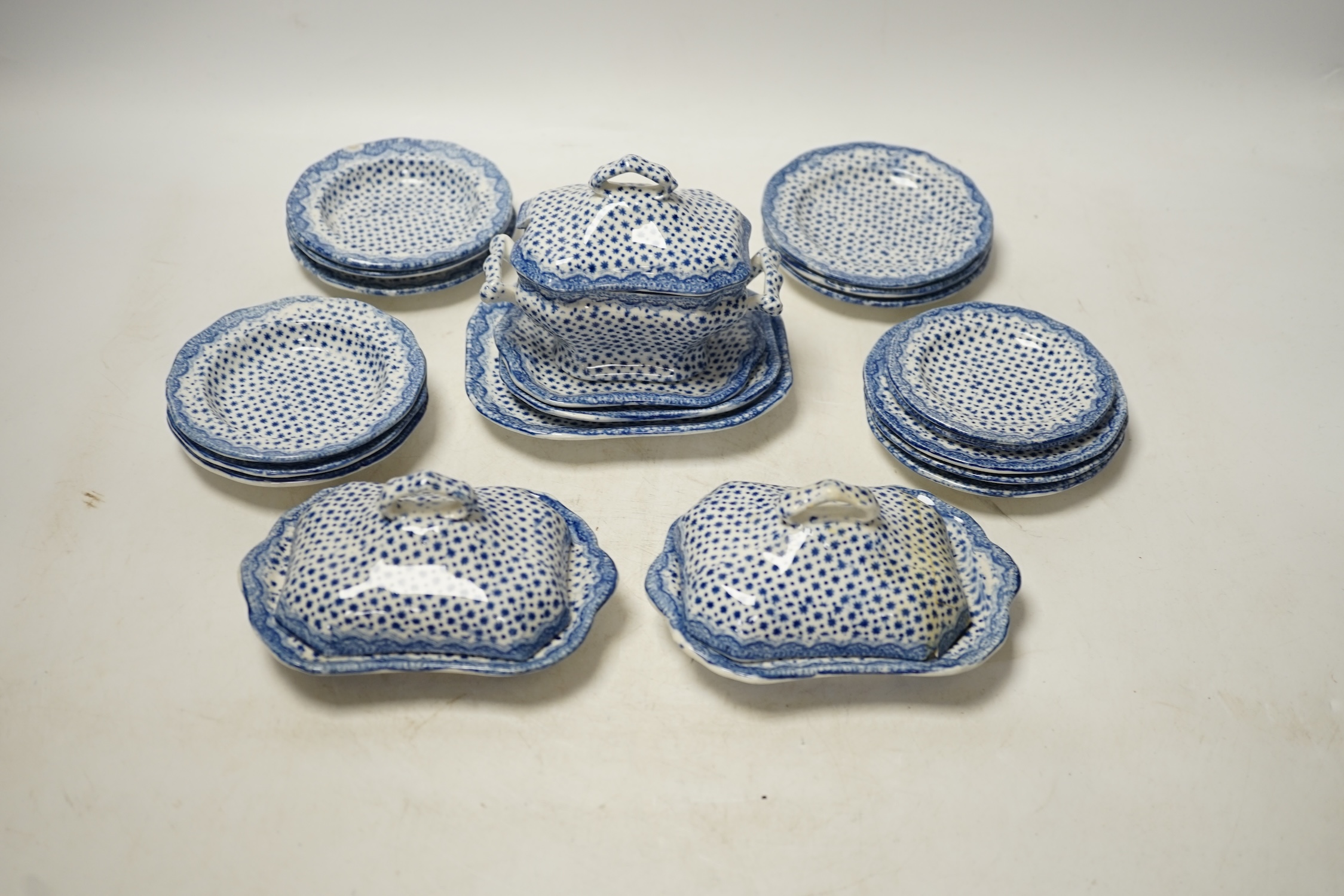 A 19th century blue and white child's twenty piece dinner service, tallest tureen 9cm high. Condition - cover on smaller tureen and soup dish cracked, manufacturing faults on the transfer printed decoration